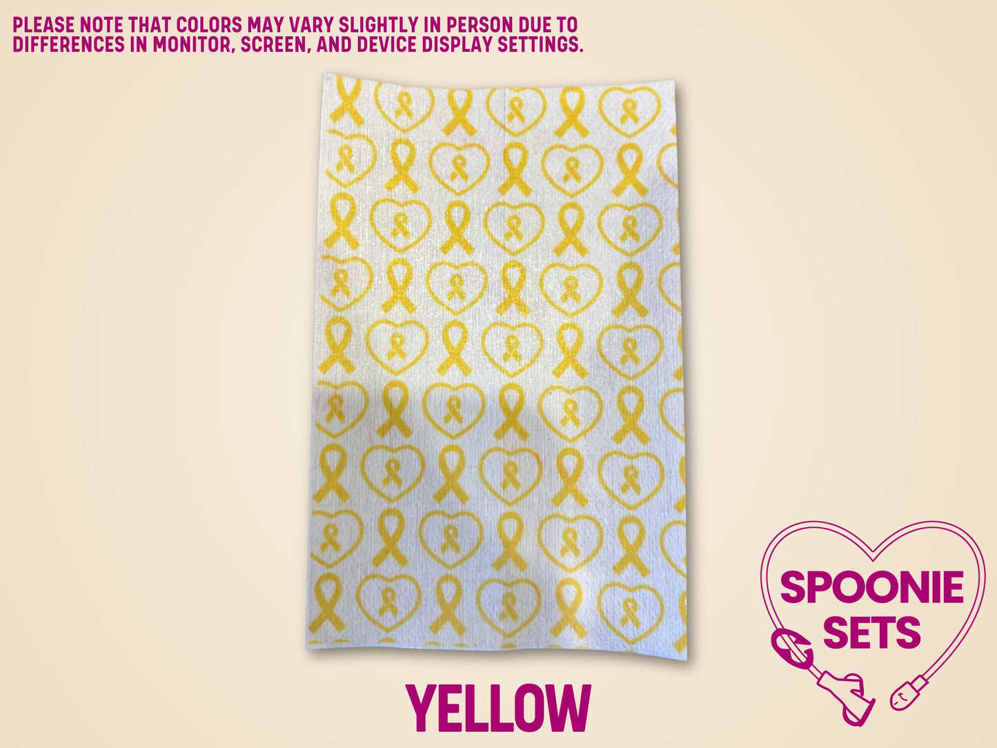 Yellow awareness ribbon tubie tape sheet, sublimation-printed Hypafix for medical device personalization.