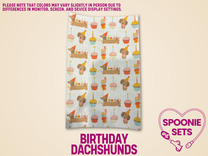 White Hypafix tubie tape sheet with colorful birthday dachshunds, party hats, and cupcakes.