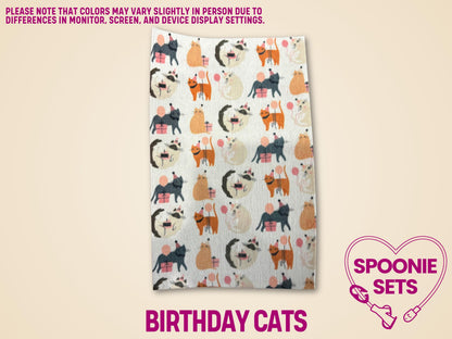 Hypafix tubie tape sheet with a pattern of colorful cats, party hats, and gifts.