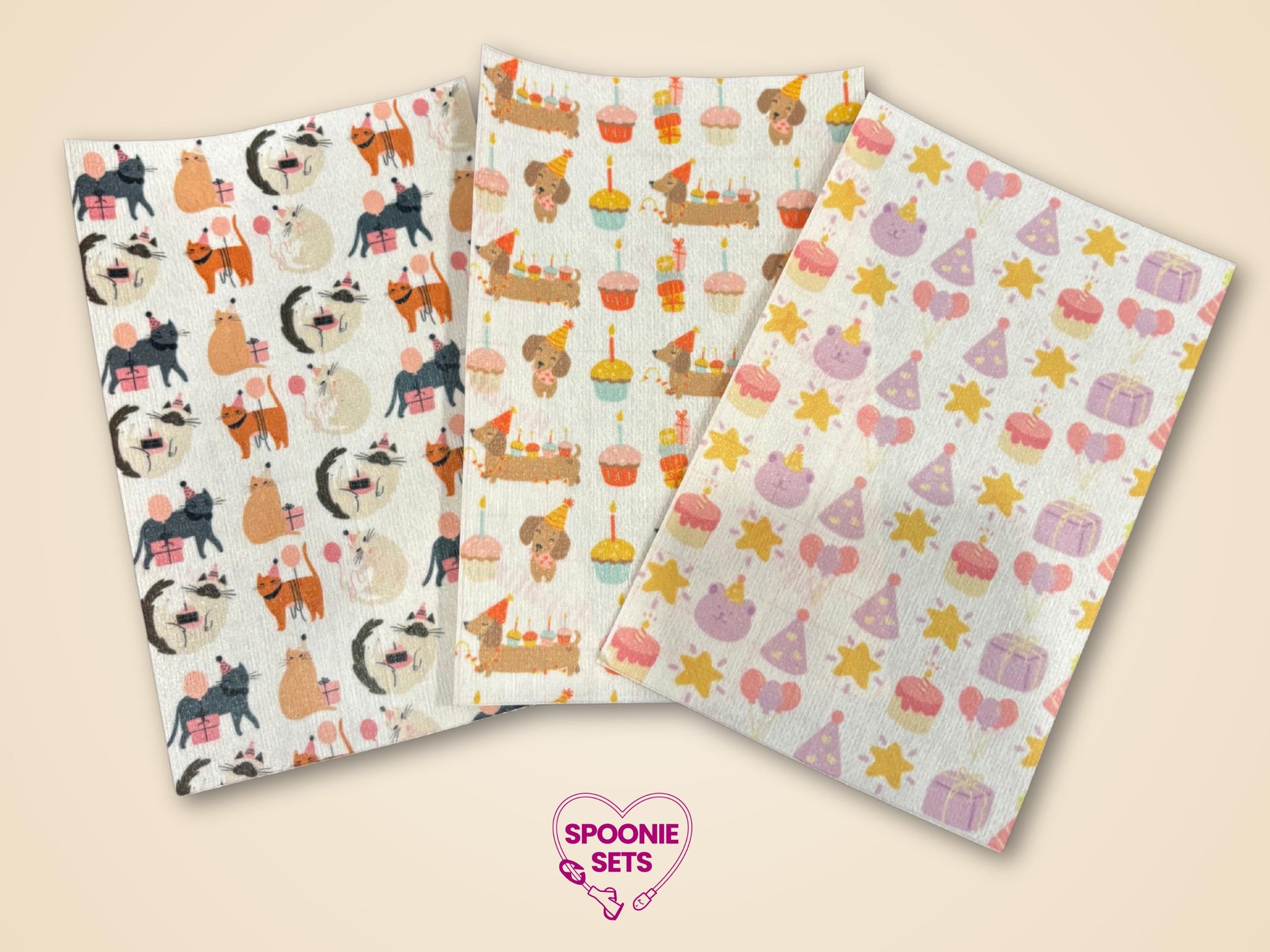 Three sheets of decorative Hypafix tubie tape with birthday designs: cats, dachshunds, and party items.