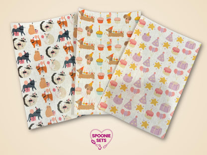 Three sheets of decorative Hypafix tubie tape with birthday designs: cats, dachshunds, and party items.