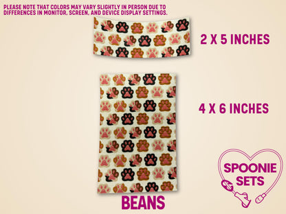 Two sheets of "Beans" tubie tape with pink, brown, and orange cat paw prints on a cream background.