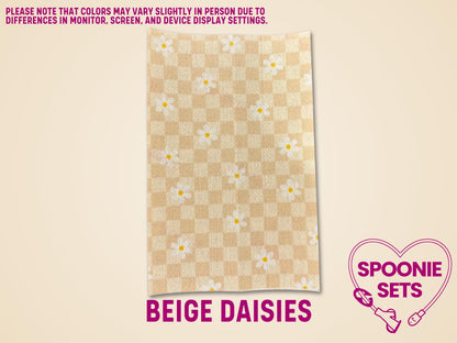 Beige checkered tubie tape with white daisy flowers, made from soft, flexible Hypafix tape.