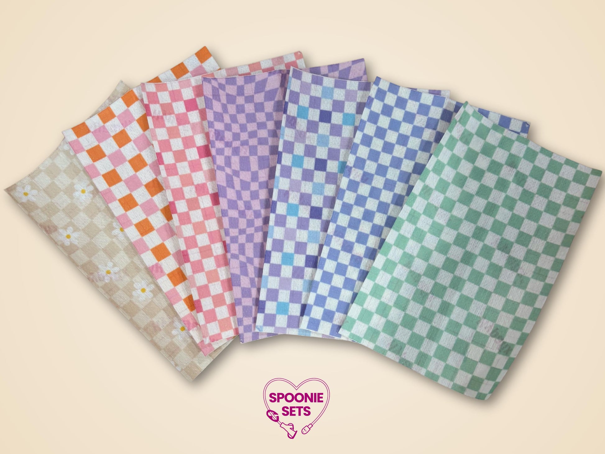 Checkered tubie tape sheets in pink, purple, green, blue, beige, and orange, plus a daisy pattern.