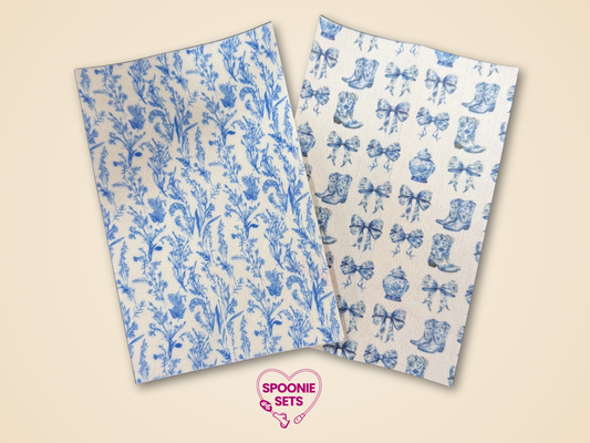Two sheets of blue floral Chinoiserie and cowgirl boots Hypafix tubie tape.