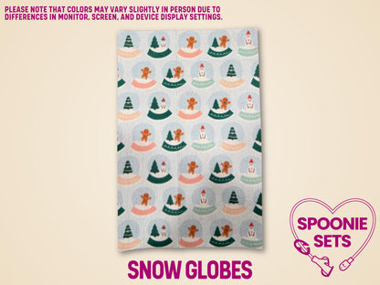 Festive Hypafix tubie tape sheet with a repeating pattern of snow globes featuring gingerbread men and trees.
