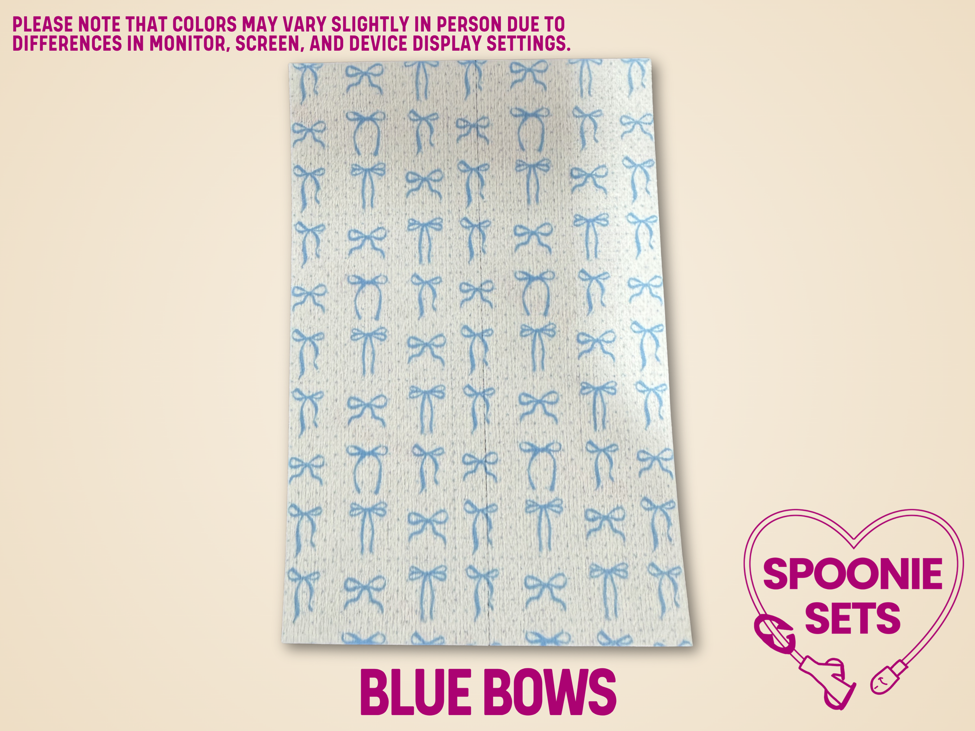 White Hypafix tubie tape sheet with a pattern of small blue bows.