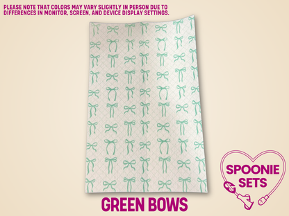 White Hypafix tubie tape sheet with a pattern of small green bows.