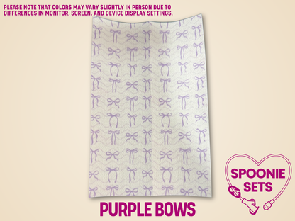 White Hypafix tubie tape sheet with a pattern of small purple bows.