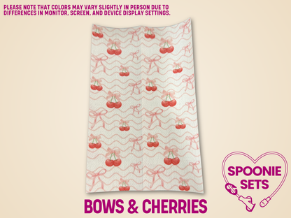 White Hypafix tubie tape sheet with a pattern of red cherries and pink bows.