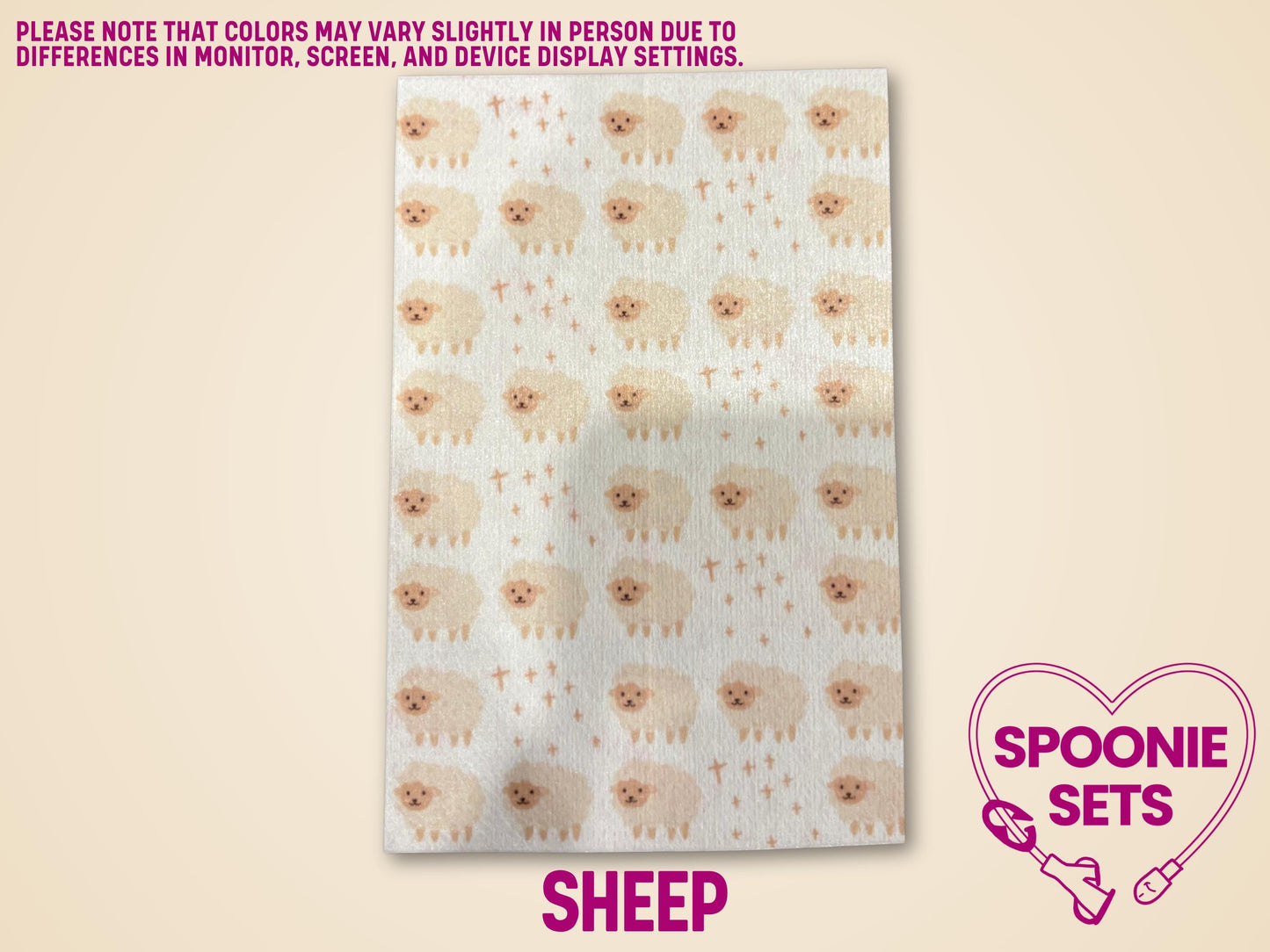 Decorative Hypafix tubie tape sheet with a pattern of light brown sheep and tiny crosses.