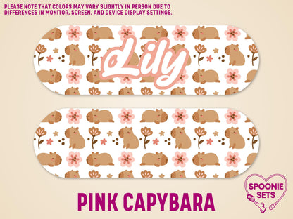Two matte, laminated feeding tube pump stickers with a pink capybara and flower pattern. One sticker features "Lily" in script.