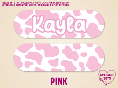 Pink cow print feeding tube pump sticker with "Kayla" in white, matte finish.