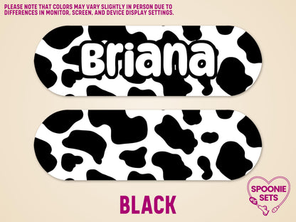Black cow print feeding tube pump sticker, personalized with "Briana" in white, matte finish.