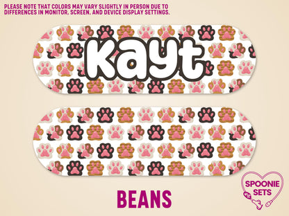 Two matte feeding tube pump stickers with colorful cat paw prints and personalized text "Kayt" and "Beans".