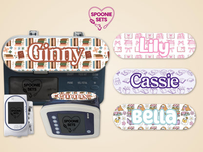 Personalized feeding tube pump stickers with book, floral, cat, ghost, and gift designs. Matte finish with laminate overlay.