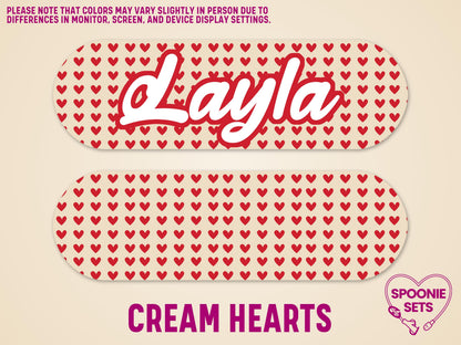 Cream feeding tube pump stickers with red heart pattern; one personalized with "Layla" in red script.