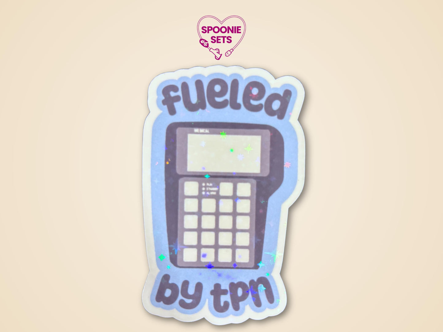 Holographic glitter sticker of a TPN pump on a light blue background with "Fueled by TPN" text.