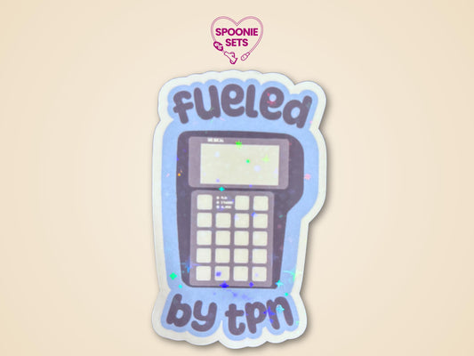 Holographic glitter sticker of a TPN pump on a light blue background with "Fueled by TPN" text.
