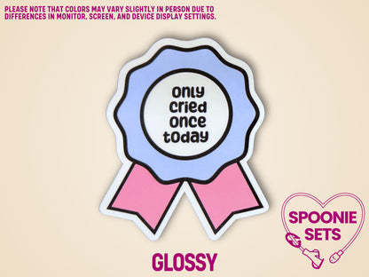 Blue and pink award ribbon sticker with "only cried once today" text, glossy finish.