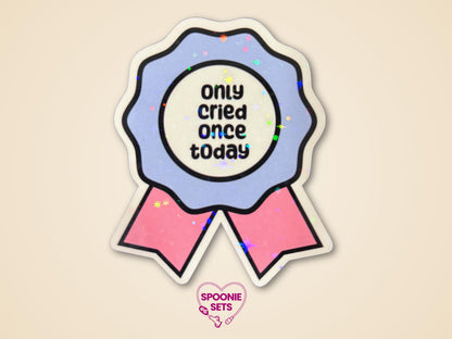 Blue and pink award ribbon sticker with "Only Cried Once Today" text and holographic glitter laminate.