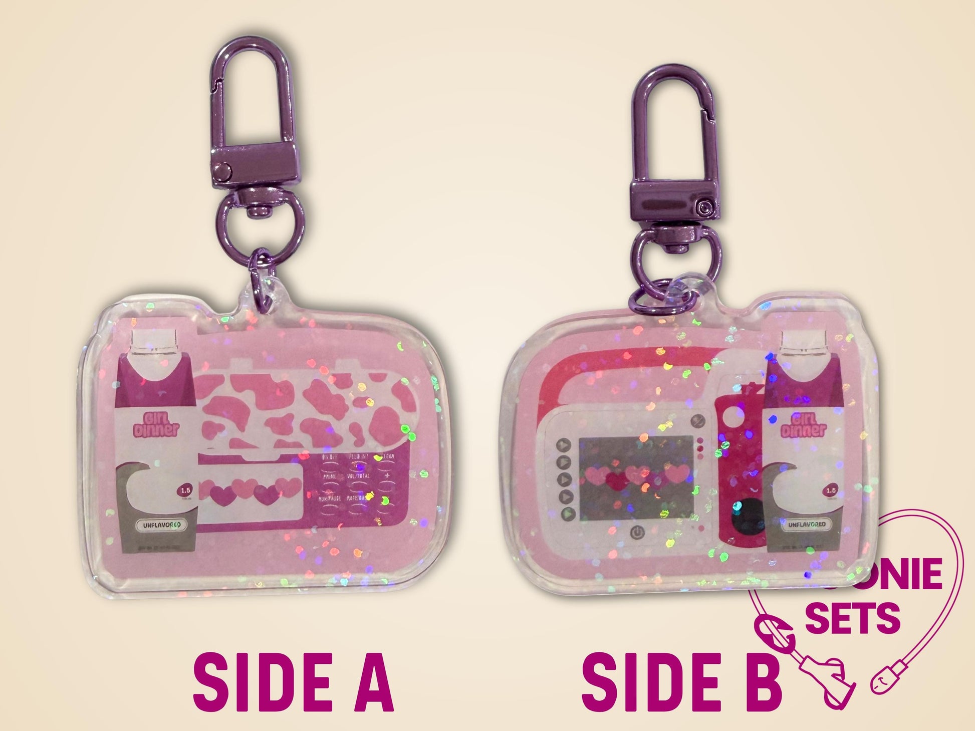 Pink acrylic keychain with "Girl Dinner" feeding tube pump and formula charm, holographic dot overlay.