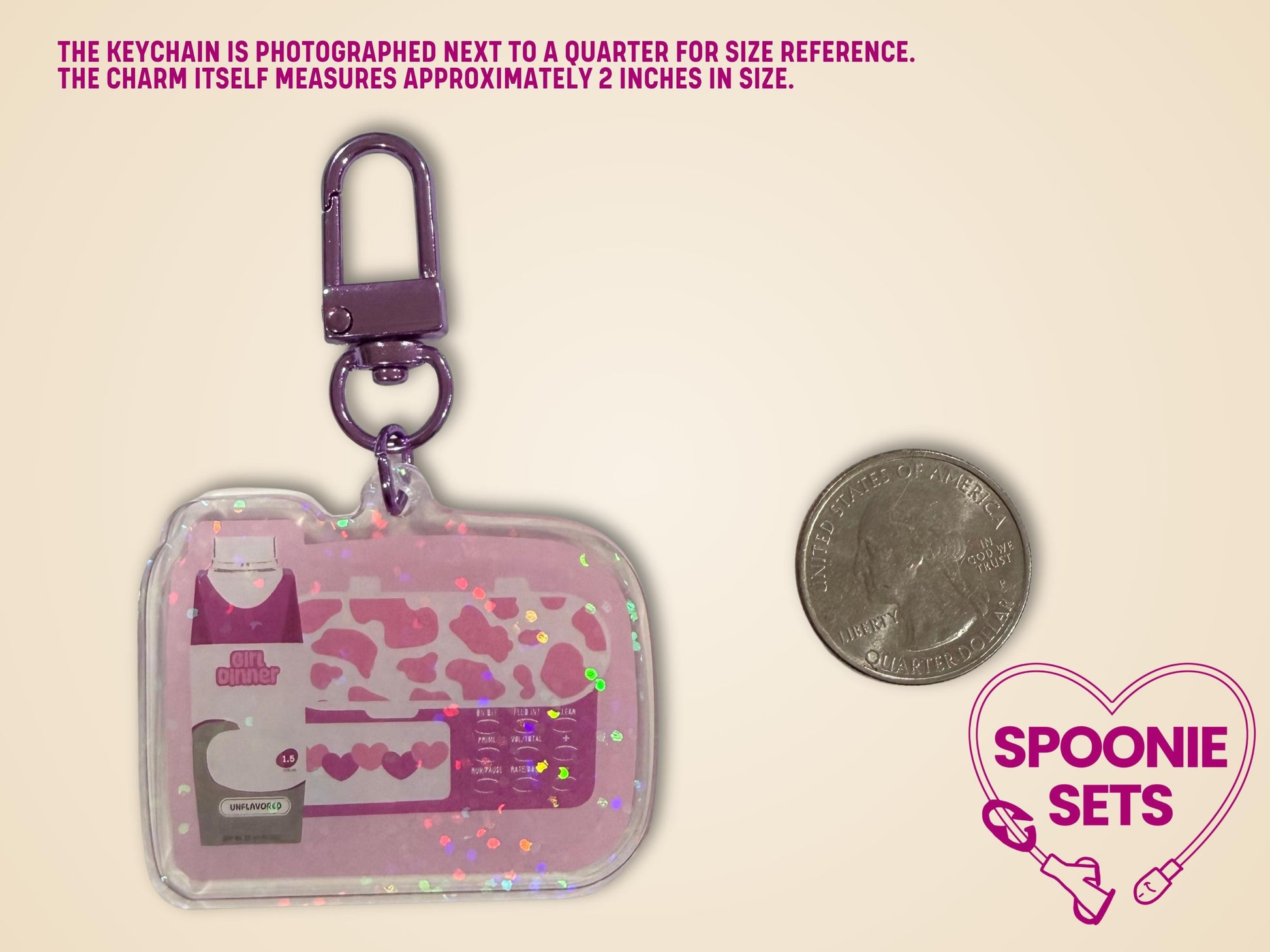 Pink "Girl Dinner" acrylic keychain with feeding tube pump and formula bottle design, holographic dot overlay, next to a quarter.