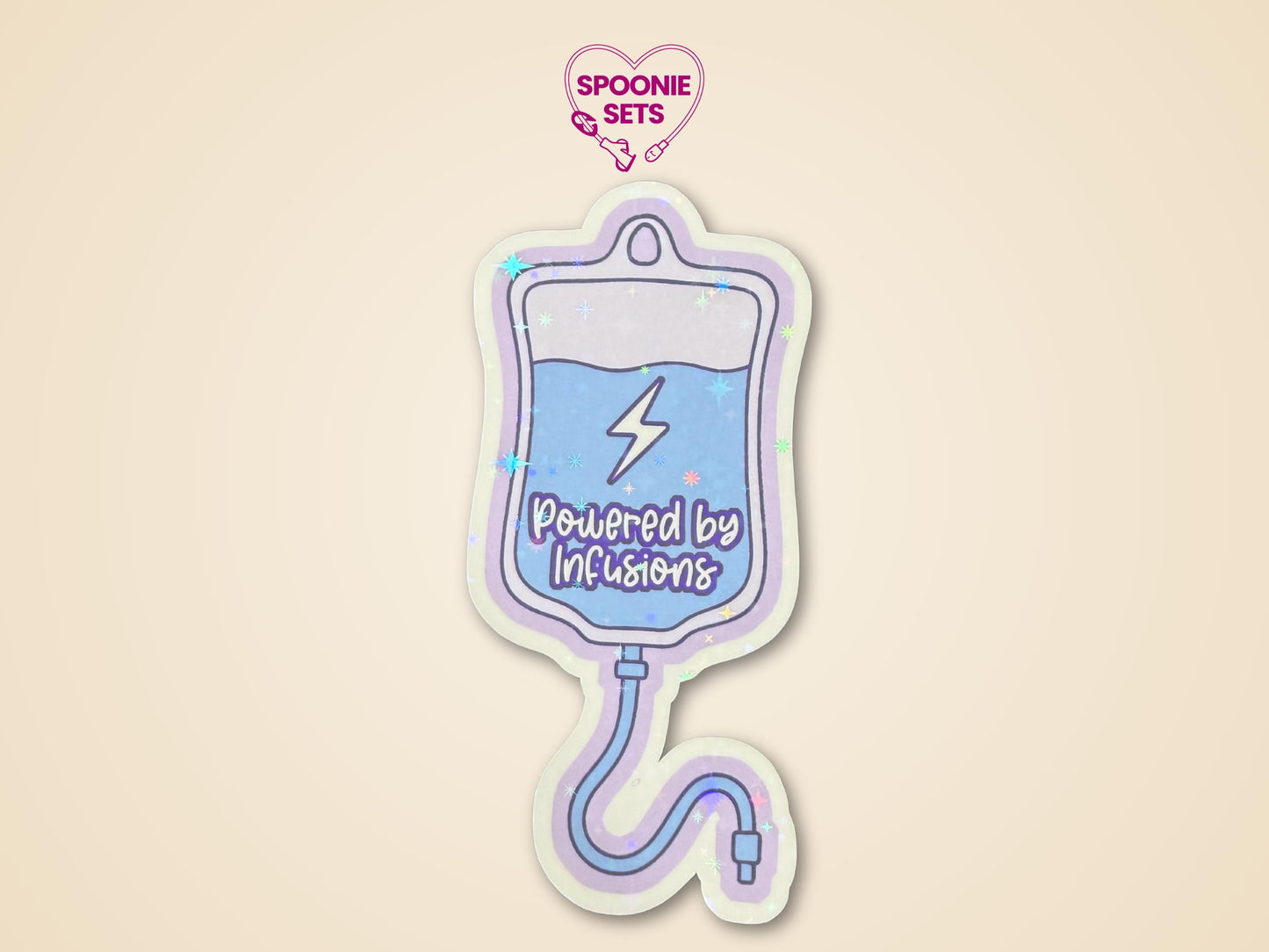 Holographic glitter sticker of a blue IV fluid bag with "Powered by Infusions" text on a purple background.