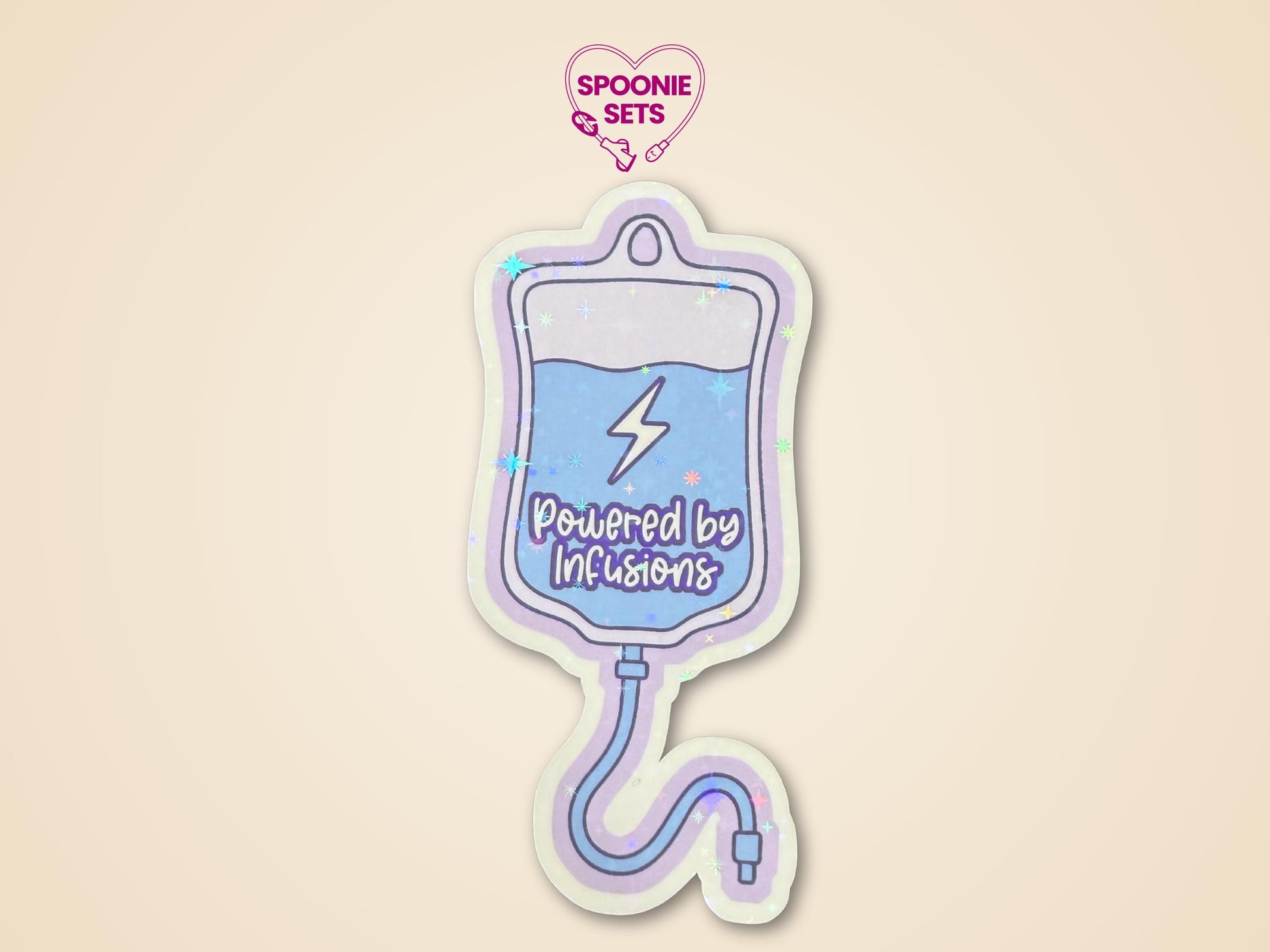 Holographic glitter sticker of a blue IV fluid bag with "Powered by Infusions" text on a purple background.