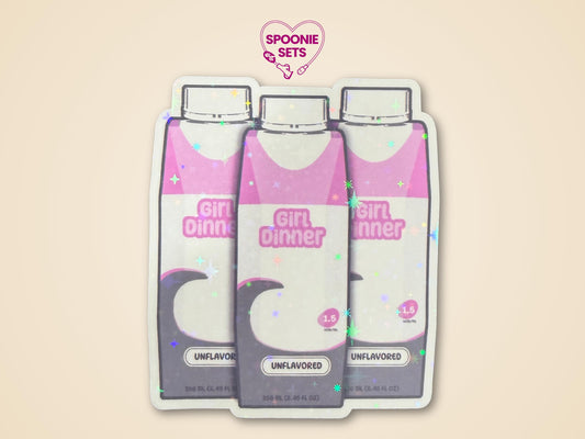 Holographic glitter sticker featuring three purple formula bottles with "Girl Dinner" text and "Unflavored.