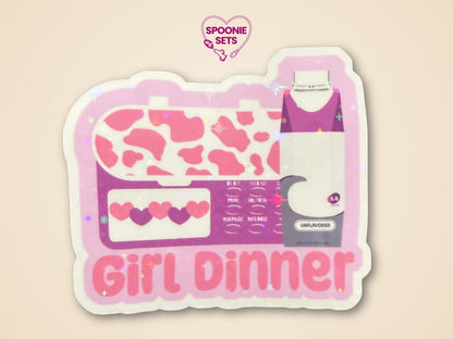 Holographic glitter sticker with a pink feeding tube pump, purple formula bottle, and "Girl Dinner" text.