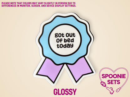 Blue and purple award ribbon sticker with "Got Out Of Bed Today" text, glossy finish.
