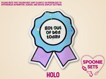 Holographic glitter award ribbon sticker with "got out of bed today" text, light blue and purple.