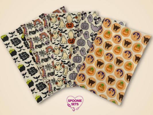 Halloween tubie tape sheets with cookies, pumpkins, ghosts, potions, bats, and black cats on Hypafix tape.