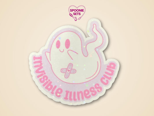 Holographic glitter sticker of a cute ghost with a bandage, text "Invisible Illness Club" in pink.