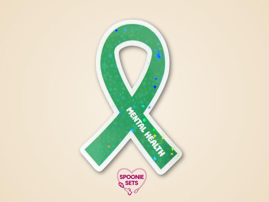 Green awareness ribbon sticker with "MENTAL HEALTH" text and holographic glitter laminate.