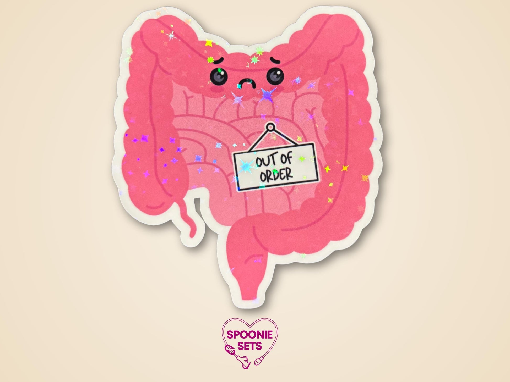 Pink intestine sticker with a sad face, "Out of Order" sign, and holographic glitter laminate.