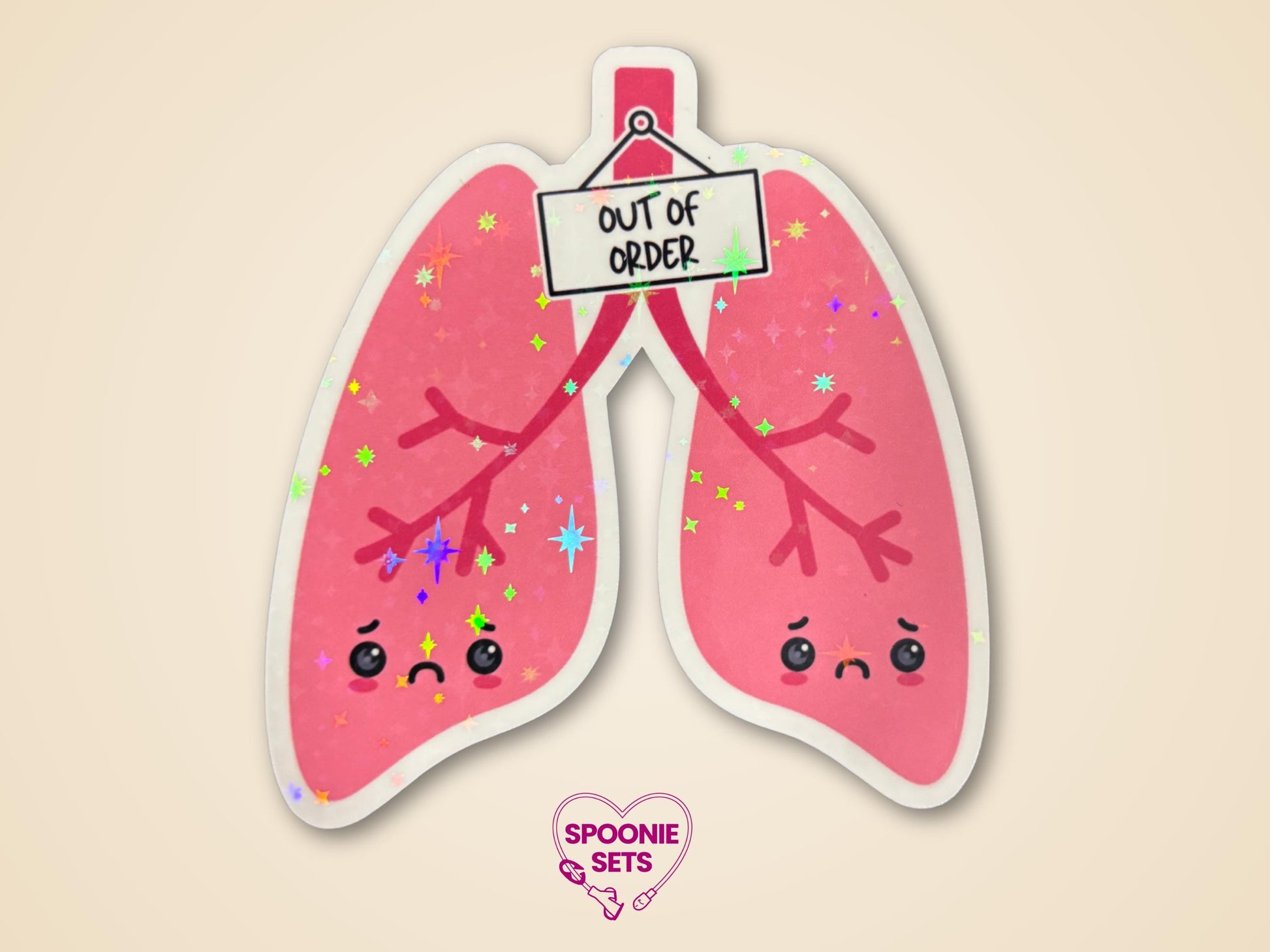 Holographic glitter sticker of pink lungs with sad faces and an "Out of Order" sign.