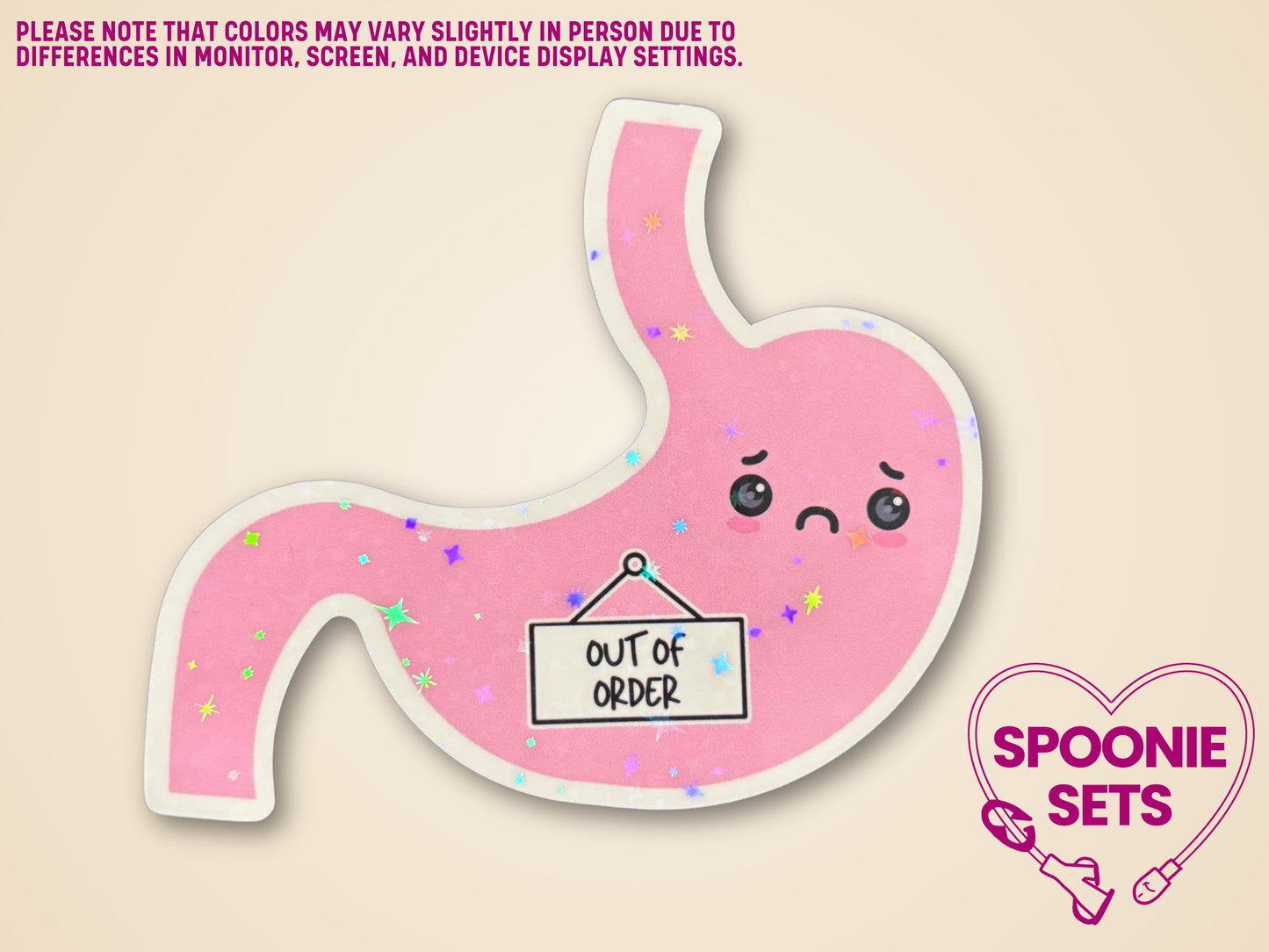 Pink stomach sticker with a frowning face, "Out of Order" sign, and holographic glitter laminate.
