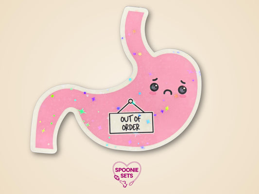 Pink stomach sticker with a frowning face, "Out of Order" sign, and holographic glitter laminate.