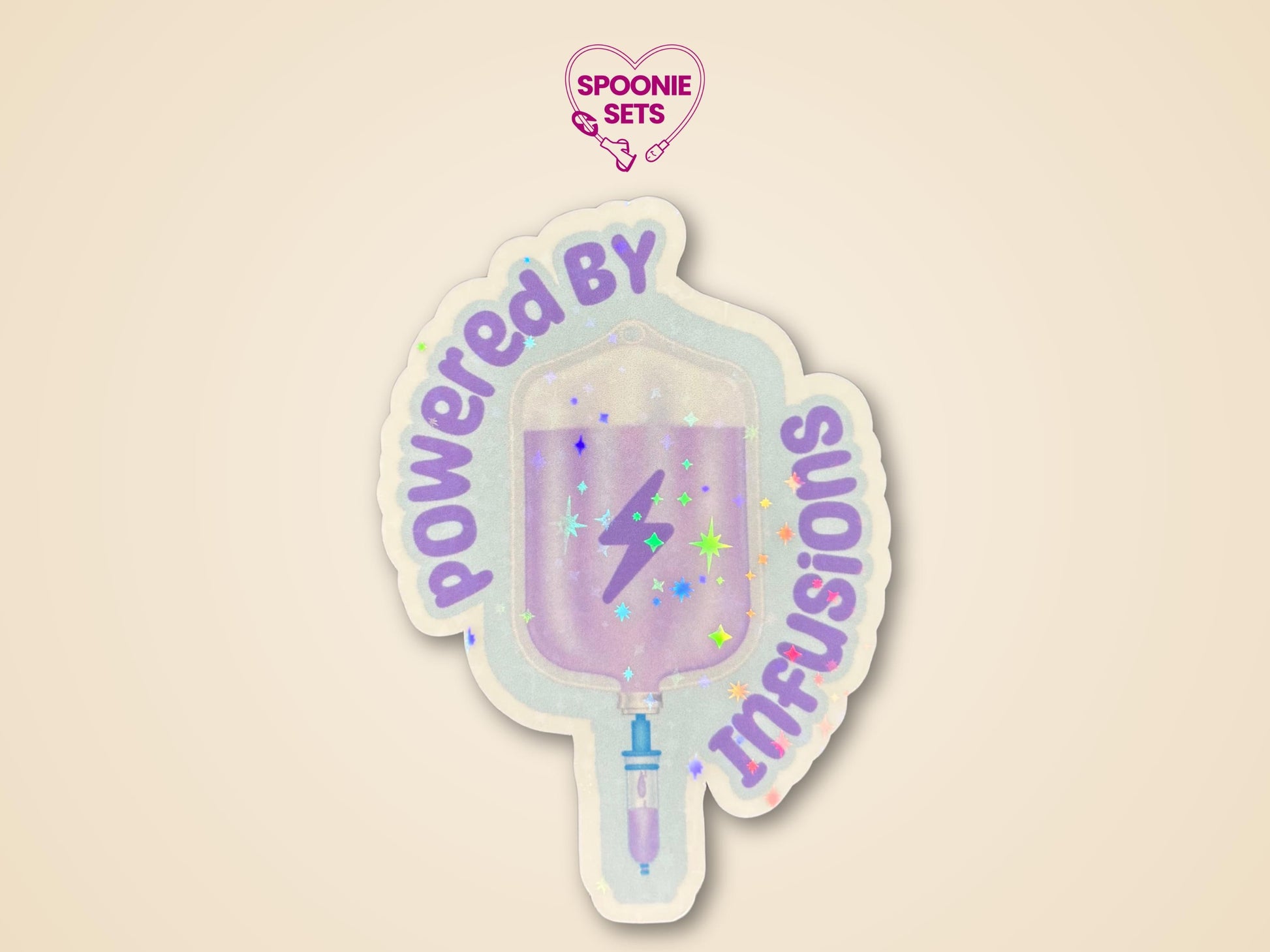 Holographic glitter sticker: purple IV bag with a lightning bolt, "Powered by IV Infusions" text.
