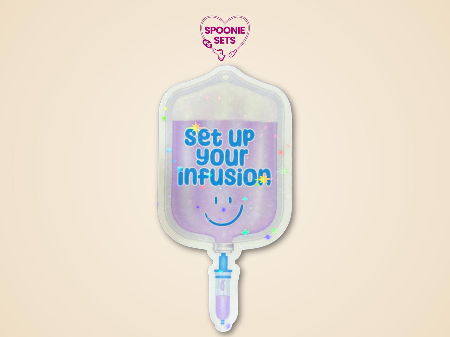 Purple IV fluid bag sticker with "Set Up Your Infusion" in blue text and a smiling face.