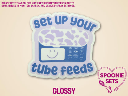 Purple and white tube feed pump sticker with "set up your tube feeds" text, glossy finish.