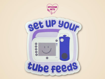 Purple and white "Set Up Your Tube Feeds" sticker with a feeding tube pump design.