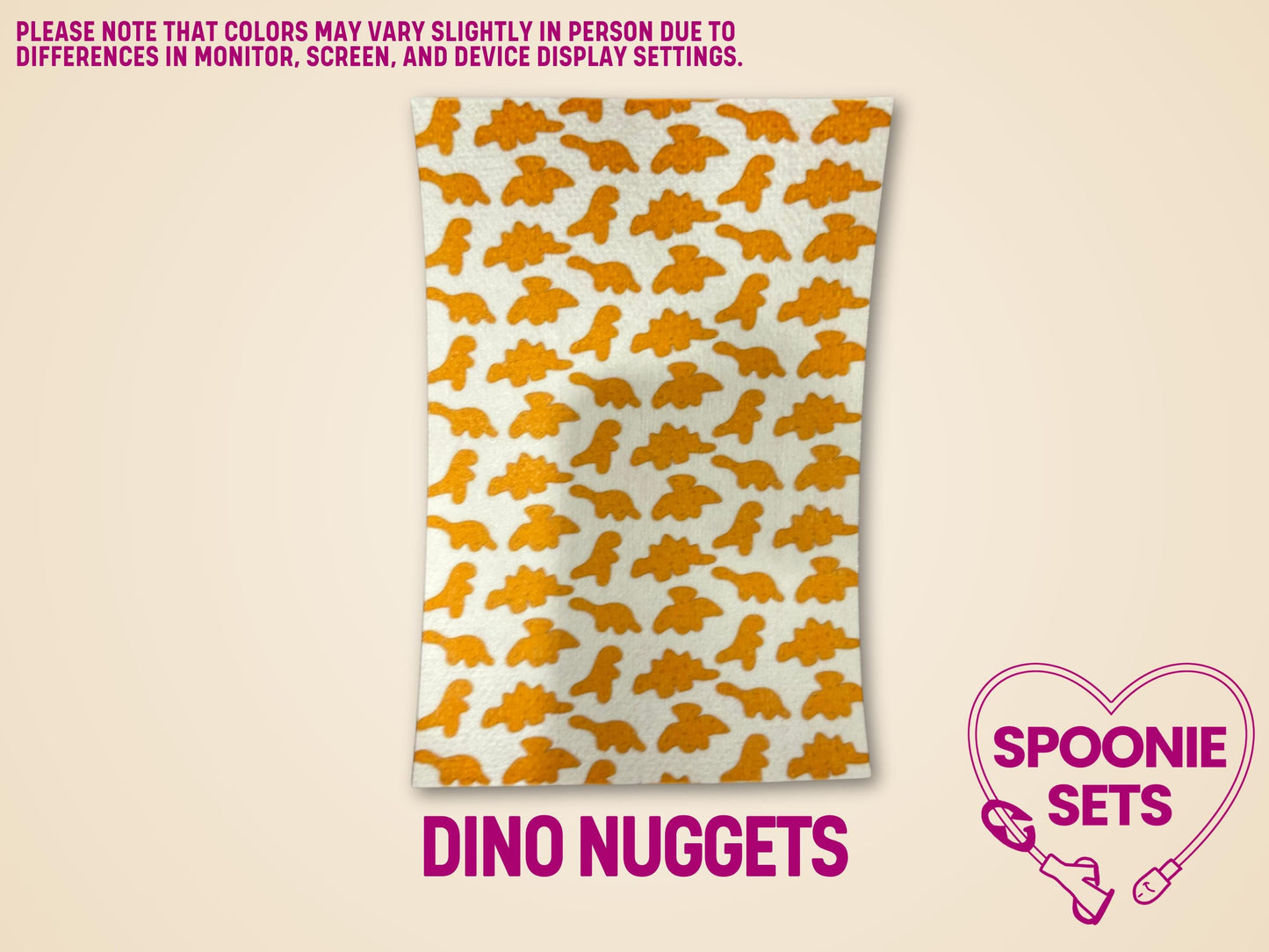 White Hypafix tubie tape sheet with orange dinosaur nugget pattern for medical devices.