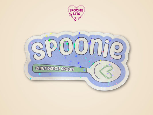 Holographic glitter "Spoonie" sticker with "emergency spoon" text and a green spoon design.