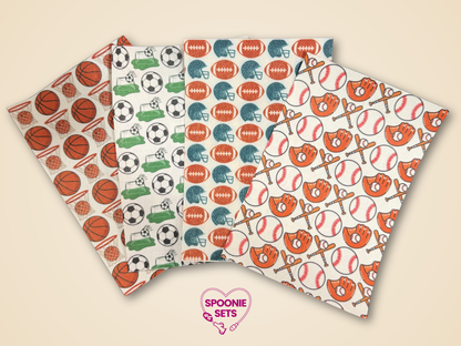 Four sheets of hypafix tape with basketball, baseball, soccer, and football patterns.