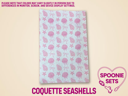Pink Hypafix tubie tape sheet with a repeating pattern of seashells and bows.