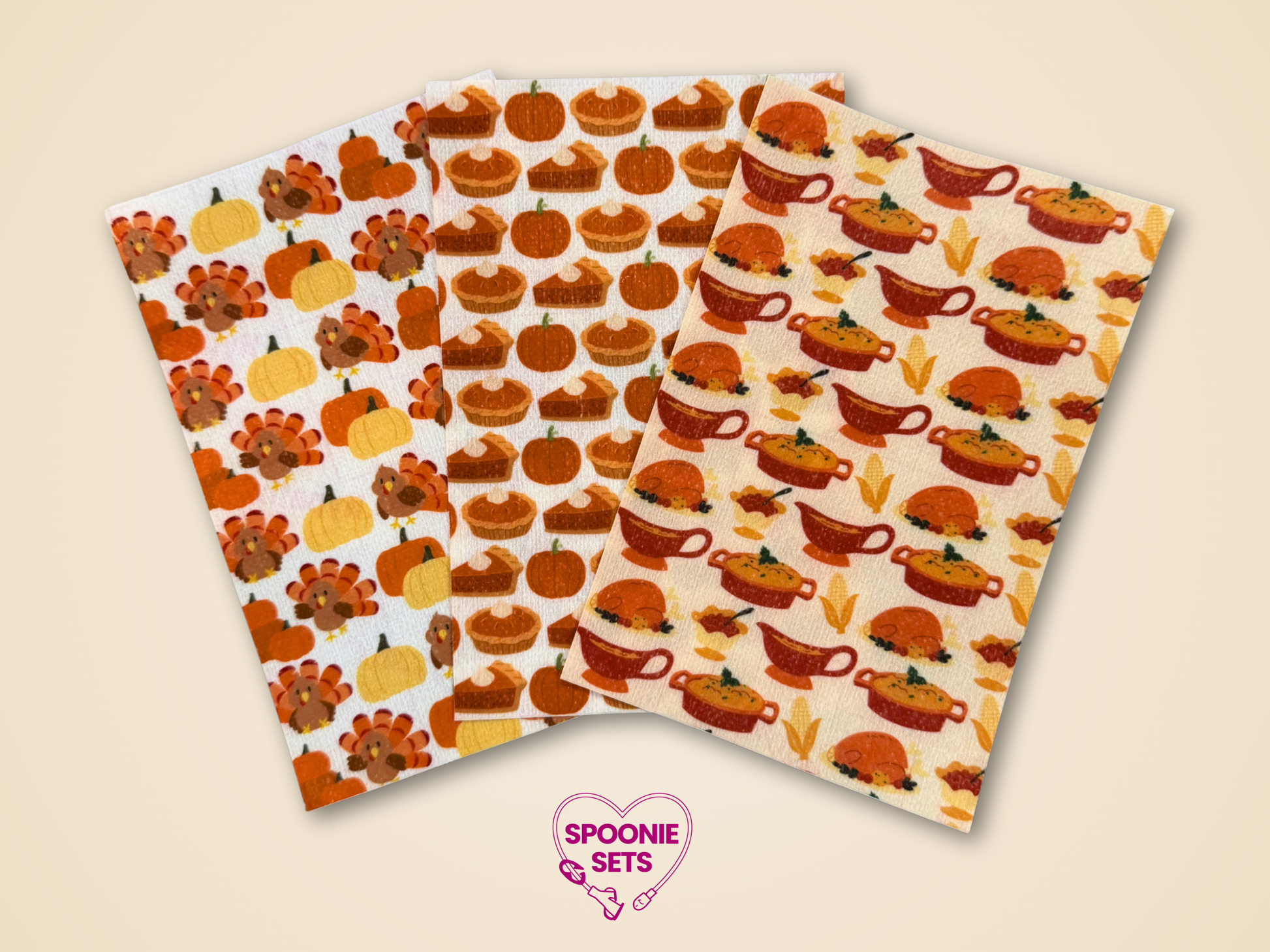 Three sheets of Hypafix tubie tape with Thanksgiving designs: pumpkin pie, holiday dinner, and turkeys with pumpkins.
