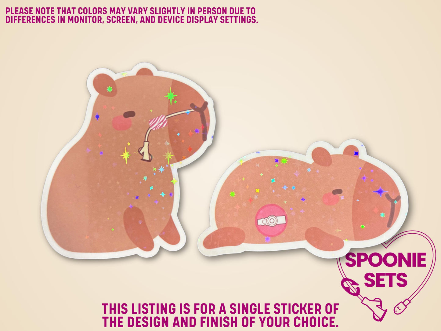 Two holographic glitter laminate capybara stickers with feeding tubes: one standing with an NG/NJ tube, one lying with a G/GJ/J tube.